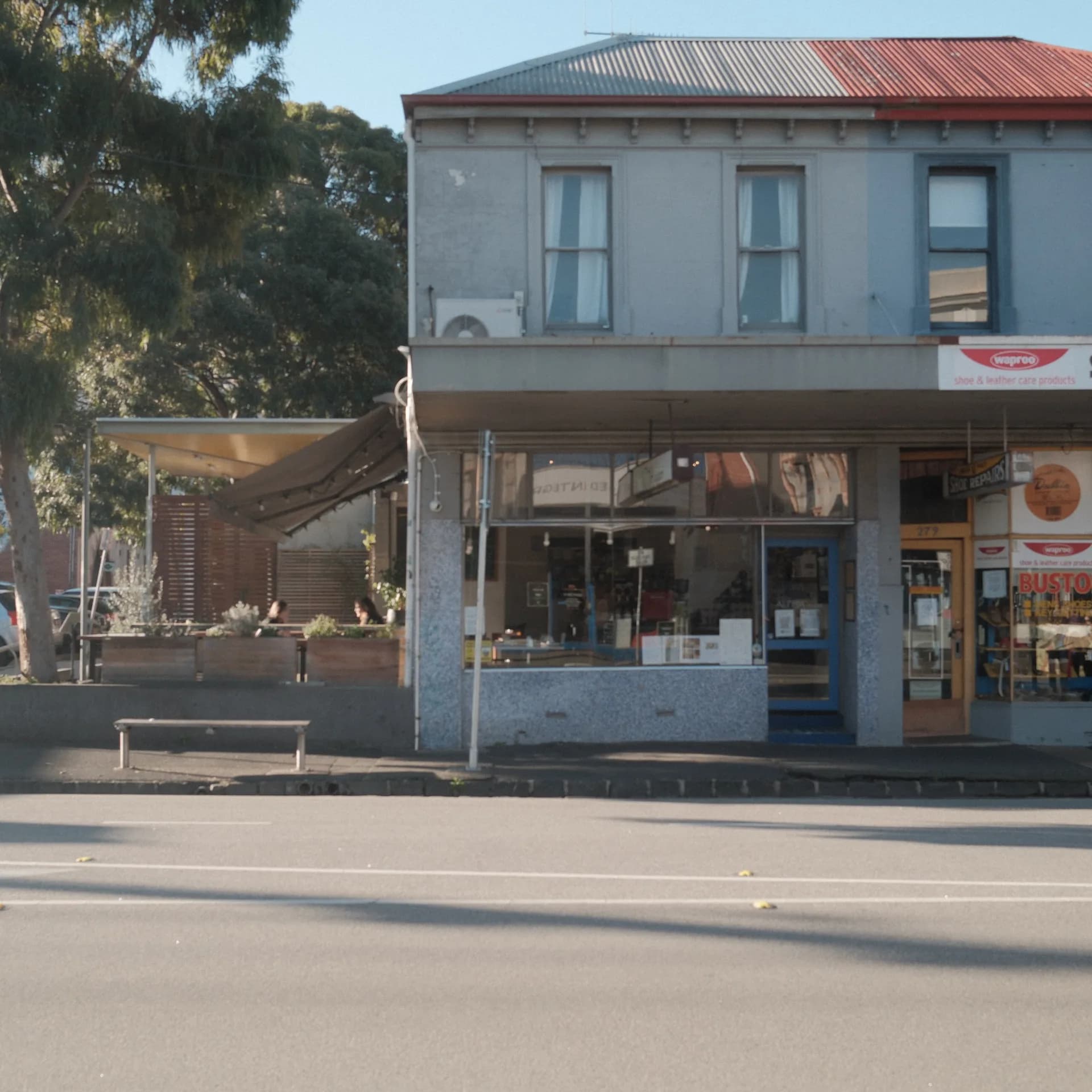 Alpha Ouzeri restaurant frontage and outdoor dining in Brunswick